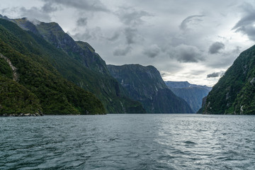steep coast in the mountains at milford sound, fjordland, new zealand 27