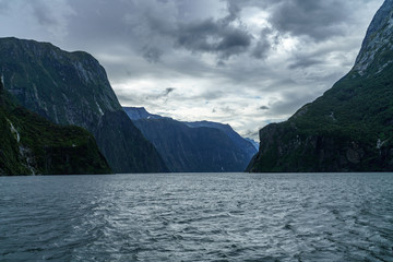 steep coast in the mountains at milford sound, fjordland, new zealand 42