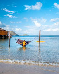 young girl on a luxury vacation at the tropical Island Saint Lucia Caribbean, woman on holliday St...