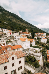 Fototapeta na wymiar Streets and sights of the old town. Panorama of the city of Perast in Montenegro.
