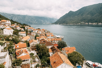  Streets and sights of the old town. Panorama of the city of Perast in Montenegro.