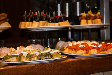 tapas, canapes or pintxos in the bar of a bar