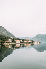 Fototapeta premium Attractions and the coastal town of Kotor. Panorama of the Gulf in Montenegro, Kindness.