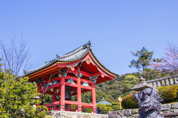 Fototapeta premium Beautiful bell tower inside Kiyomizu-dera temple. The iconic Buddhist temple in kyoto during cherry blossom time are going to bloom, Japan.