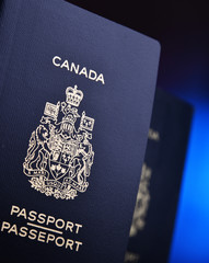 Composition with two Canadian passports