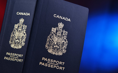 Composition with two Canadian passports