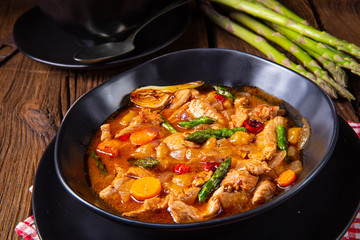 colorful turkey fricassee with asparagus and paprika