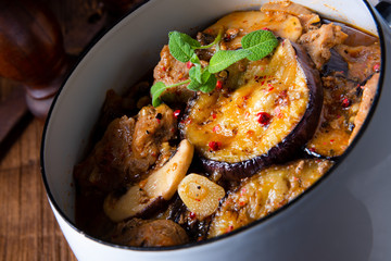 Veal goulash with baked aubergine and herbs