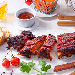 BBQ spare ribs from a charcoal grill
