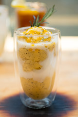 Passion fruit smoothie on table