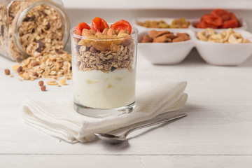 Homemade yogurt with granola, dried fruit and nuts bio with most healthy seed.