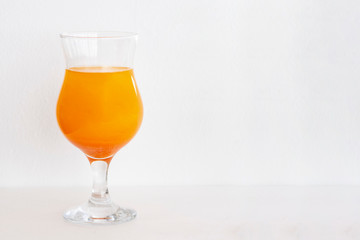 cocktails orange with glitter on a white background. copy space, space for text