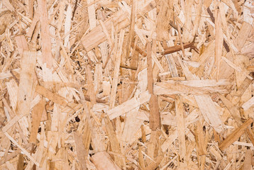 Plywood board texture.  Compressed sawdust panel background. Wood surface for interior design and decoration.