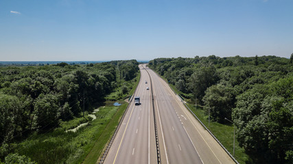 Aerial Shot Of A Highway Passing Through The Rural Countryside