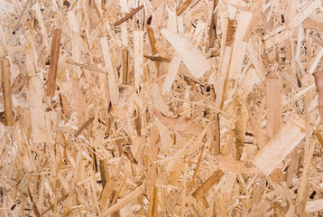 Plywood board texture.  Compressed sawdust panel background. Wood surface for interior design and decoration.