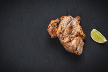 Top view beef steak is placed on a black background.