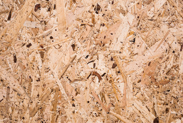 Plywood board texture.  Compressed sawdust panel background. Wood surface for interior design and decoration.