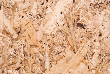 Plywood board texture.  Compressed sawdust panel background. Wood surface for interior design and decoration.