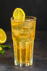 lemonade with lemon and ice (cooling drink). top food background. copy space