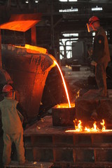 Work in the foundry. molten metal worker at a metallurgical plant