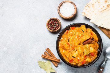 Chicken tikka masala with rice top view.