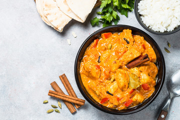 Chicken tikka masala with rice top view.