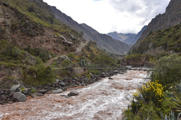Bridge across the Urubamba river at the start point of the Inca Trail to Machu Picchu. Cusco, Peru