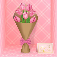 Bouquet of tulips in craft paper on a shop window