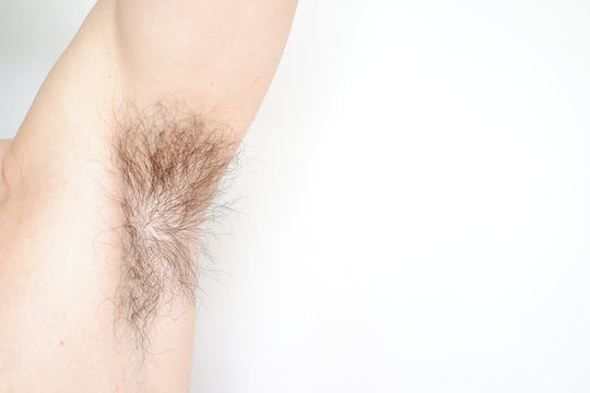 Close up armpit with long hair isolated background	