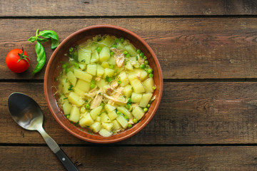 soup with green peas, potatoes, chicken and pasta (fresh vegetable soup with meat). Top view. copy space