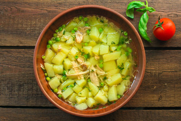 soup with green peas, potatoes, chicken and pasta (fresh vegetable soup with meat). Top view. copy space