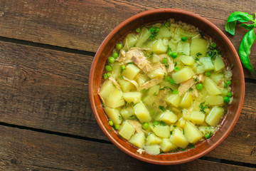 soup with green peas, potatoes, chicken and pasta (fresh vegetable soup with meat). Top view. copy space