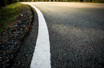 White line on the road.