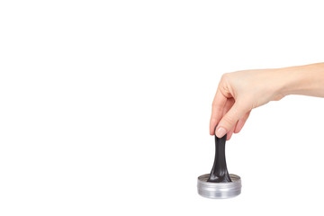 Teenager playing black slime with hand, transparent toy
