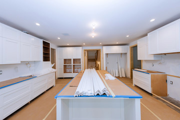 White of kitchen wooden cabinets with contemporary look