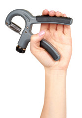 Hand with expander, sport equipment. Isolated background