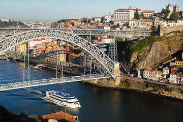 Fototapeta na wymiar Top view of the Douro river and Dom Luis I bridge in Porto, Portugal.