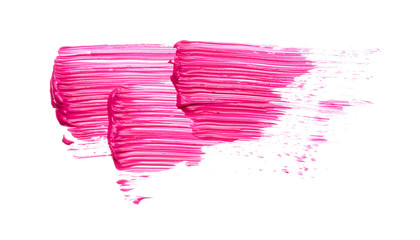 Pink strokes and texture mascara or acrylic on a white background