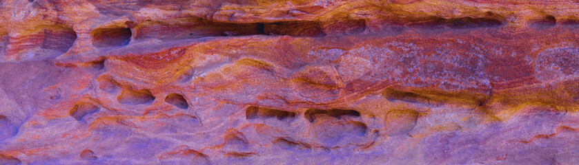 Coloured Canyon is a rock formation on South Sinai (Egypt) peninsula. Desert rocks of multicolored sandstone background.	