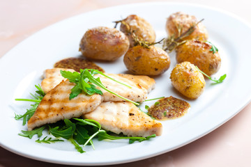 Still lifegrilled cod with potatoes