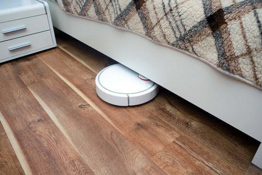 robotic vacuum cleaner cleaning the room
