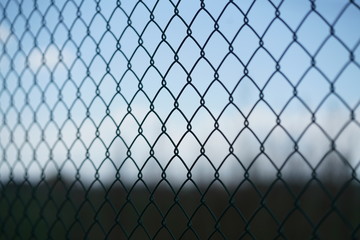 metal mesh against the sky