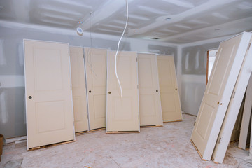 Interior construction of housing project with door installed