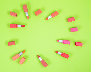 Colorful lipsticks on Makeup table.