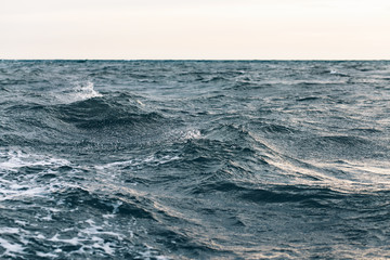 dark blue sea water background, shades of blue in black sea
