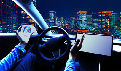 Person using a car in autopilot mode hands free