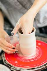 Ceramic mug made on a Potter's wheel in the workshop