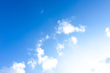 Nature Bright blue Sky with white clouds on blackground. Beautiful sky and clouds in the afternoon.