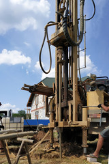 Well drilling on the water, the installation is in the car, the drilling process is close-up.