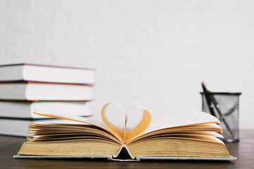 open book on desk, knowledge and education concept